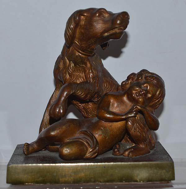 VICTORIAN BRONZE FIGURE OF DOG AND CHILD.