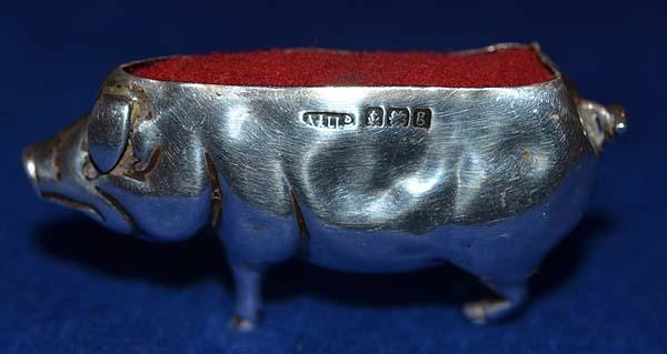 SILVER EDWARDIAN PIG PIN CUSHION.