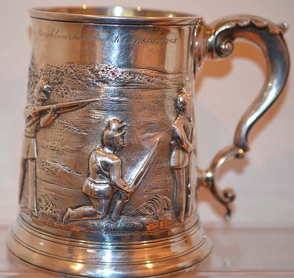 ENGLISH SILVER TANKARD DATED 1745 DECORATED WITH 3 SOLDIERS OF THE DEVON RIFLE BRIGADE WITH PRESENTATION INSCRIPTION.