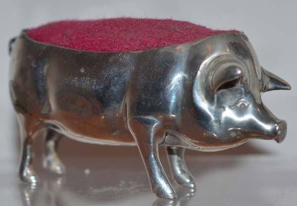 LARGE SILVER EDWARDIAN PIG PIN CUSHION.