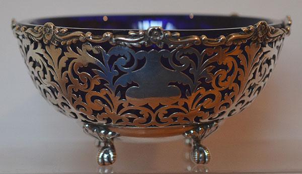 DECORATIVE LATE VICTORIAN SILVER BOWL WITH BLUE GLASS INSERT.