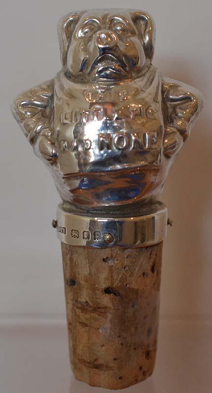 SILVER NOVELTY BOTTLE STOPPER MODELD AS A PIG. 