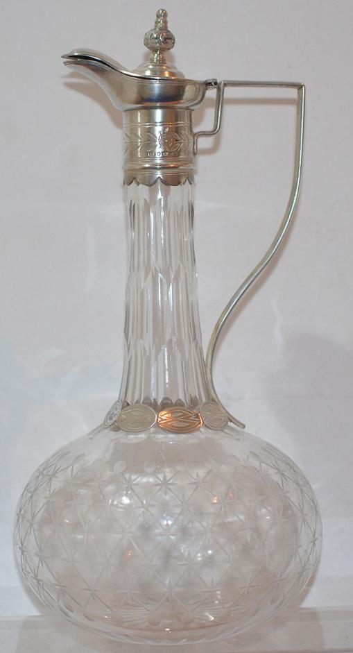 BRITISH VICTORIAN SILVER AND GLASS CLARET JUG.