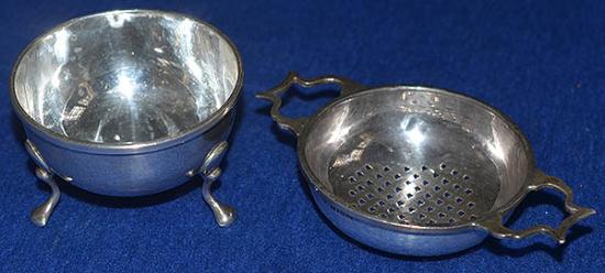 SILVER NOVELTY TEA STRAINER AND POT BY SAMPSON MORDAN.