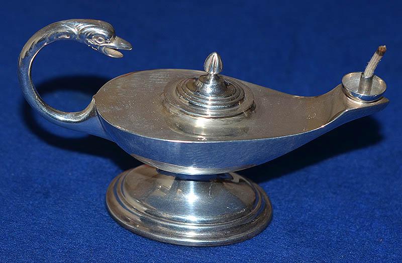SILVER WICK LIGHTER DESIGNED AS A LAMP.