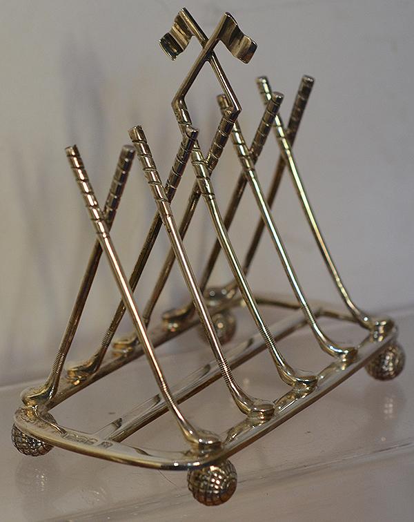 SILVER LETTER RACK DESIGNED AS TEN GOLF CLUBS.