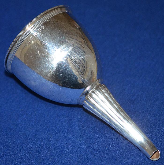 SILVER GEORGIAN WINE FUNNEL AND MATCHING STRAINER.