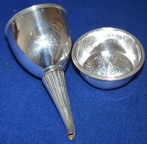 SILVER GEORGIAN WINE FUNNEL AND MATCHING STRAINER.