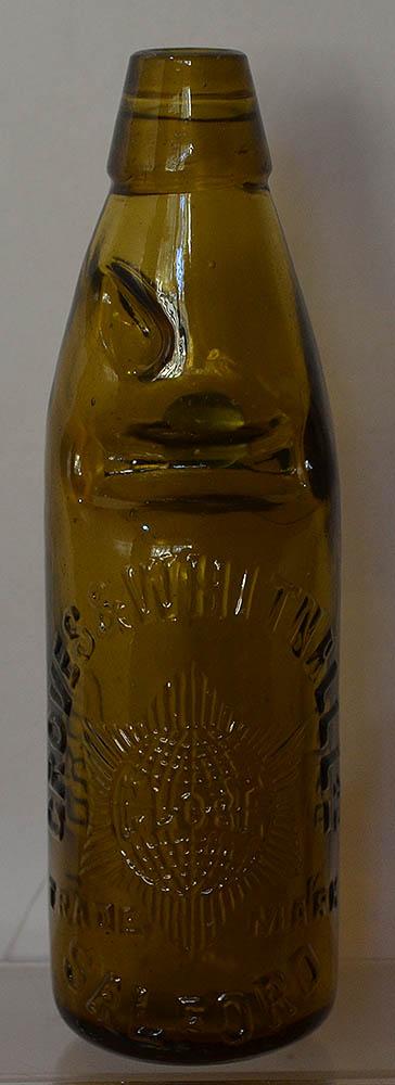 AMBER GLASS CODD BOTTLE.